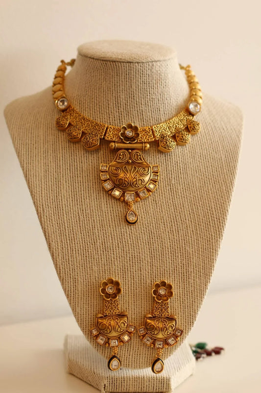 Gorgeous Matt gold necklace set with white stone details