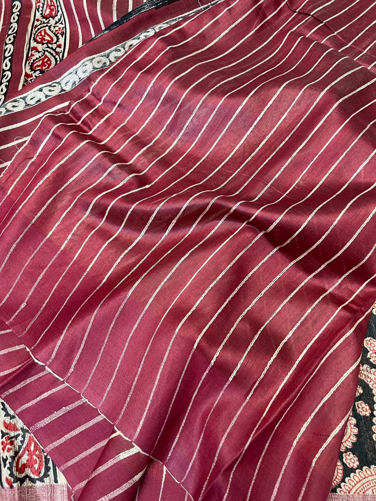 Handloom Giccha silk saree β Ajrakh block prints