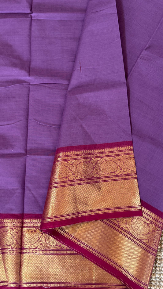 Purple saree with a gold and red border