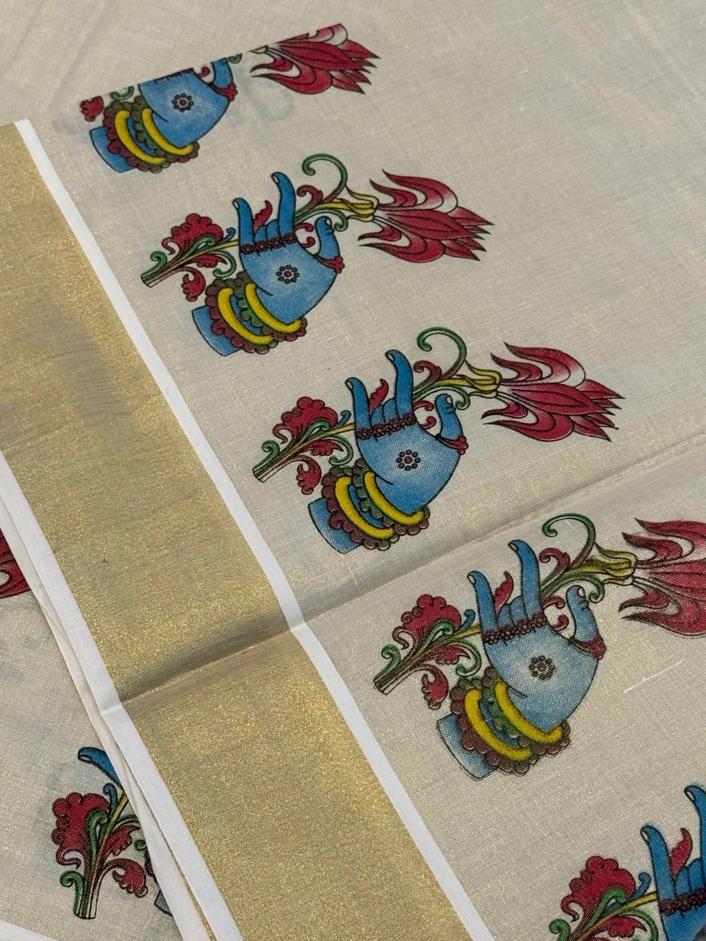 Onam tissue silk saree with gold zari border