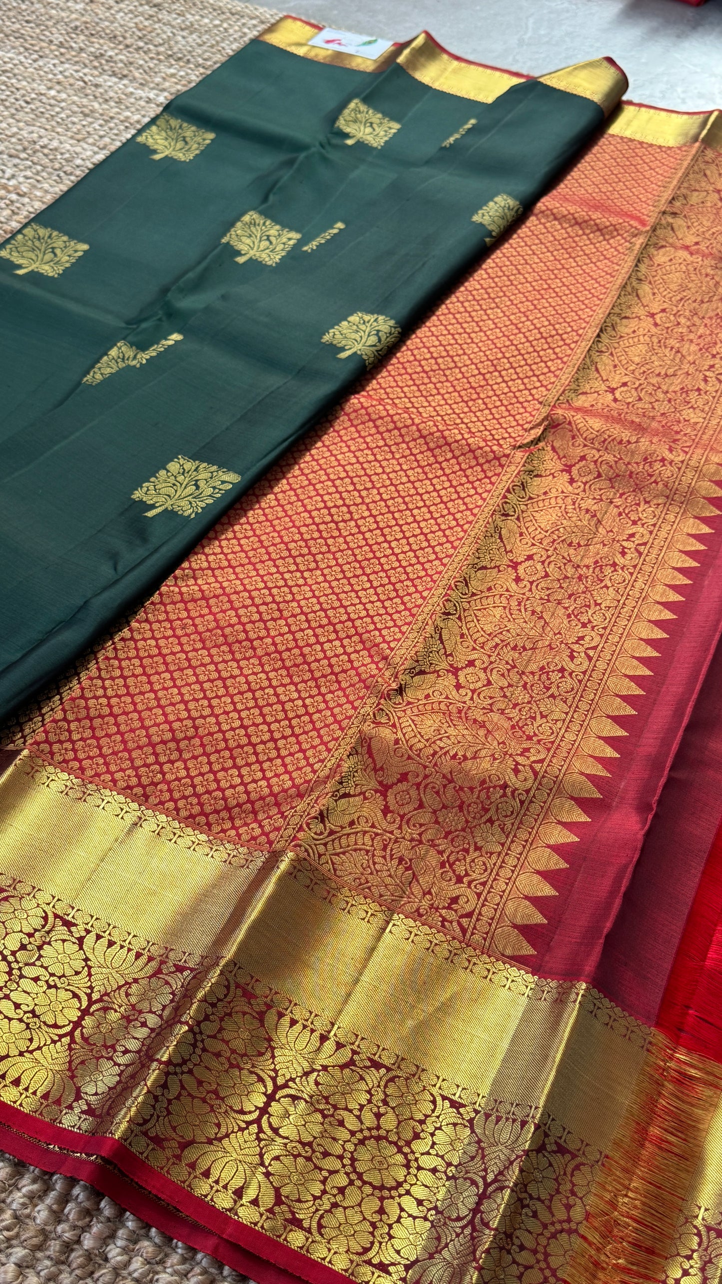 KANJIVARAM PURE SILK HANDLOOM SAREE in Bottle Green and contrast Red Pallu and Border