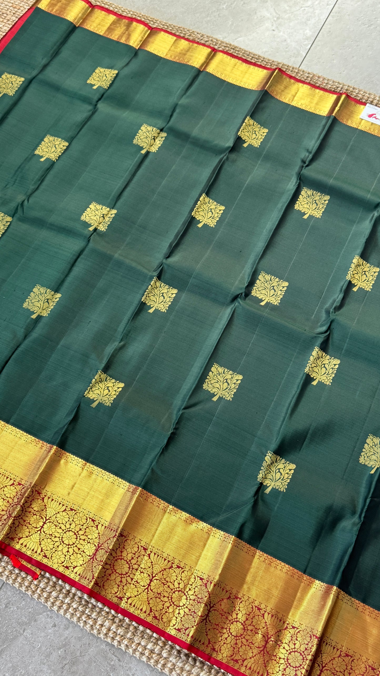 KANJIVARAM PURE SILK HANDLOOM SAREE in Bottle Green and contrast Red Pallu and Border