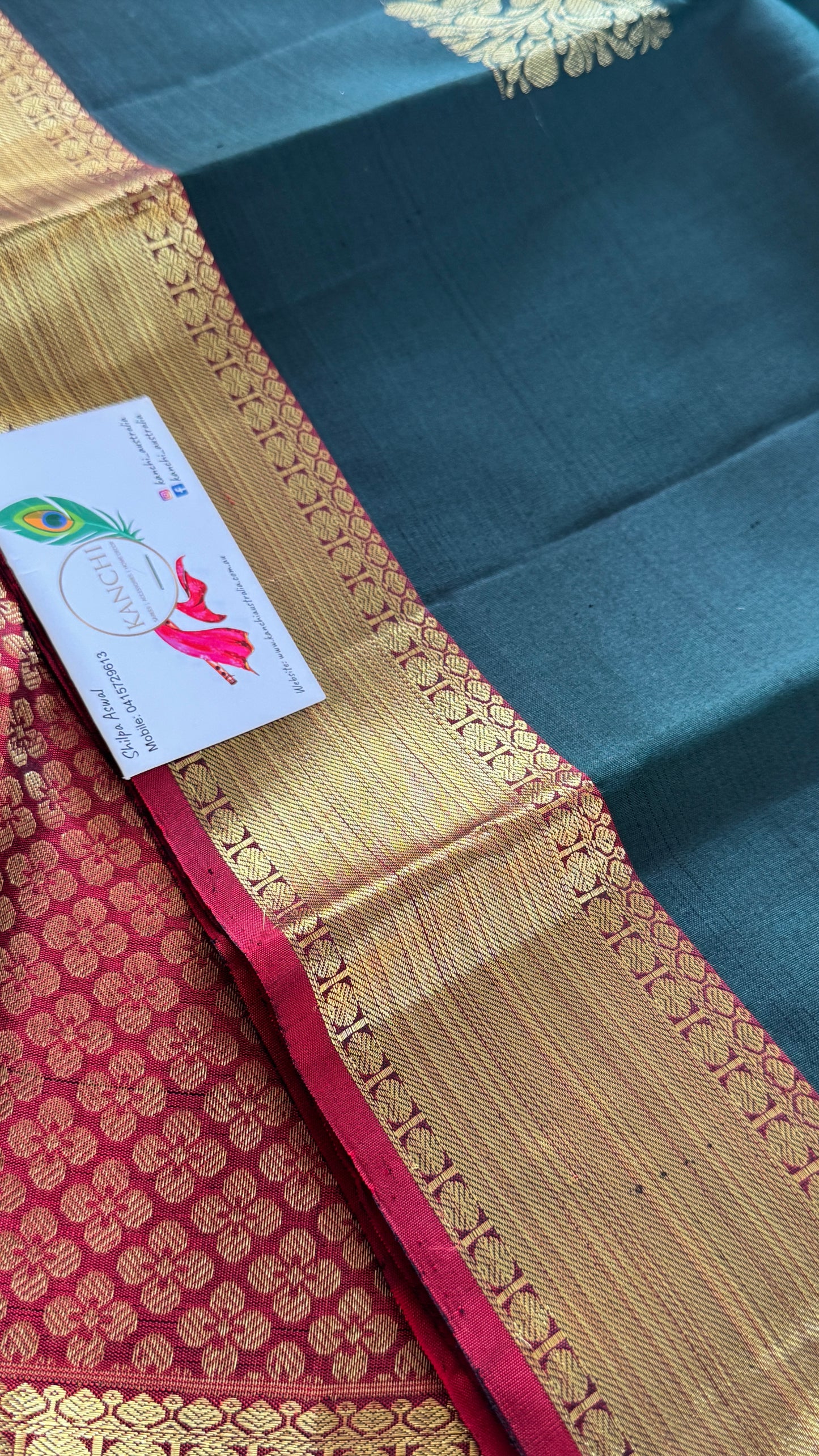 KANJIVARAM PURE SILK HANDLOOM SAREE in Bottle Green and contrast Red Pallu and Border