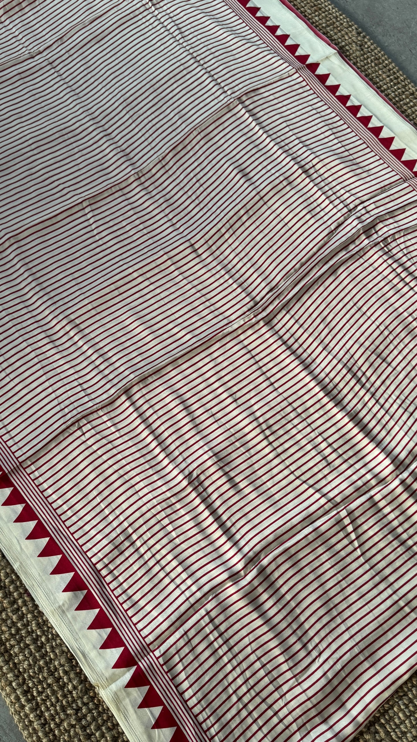 White and Red Modal Satin Saree with Temple Printed Border & Circle Design Pallu