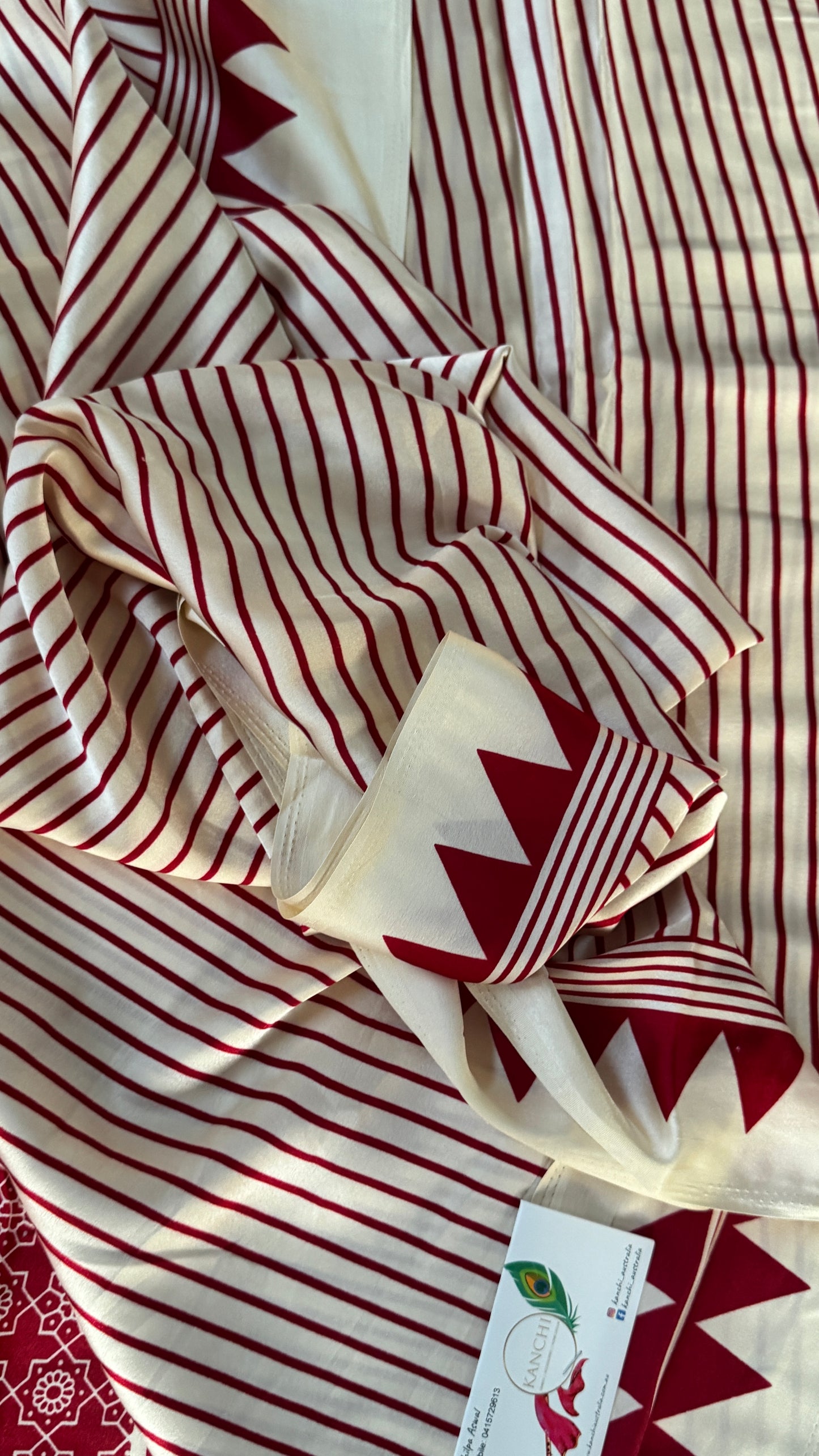 White and Red Modal Satin Saree with Temple Printed Border & Circle Design Pallu