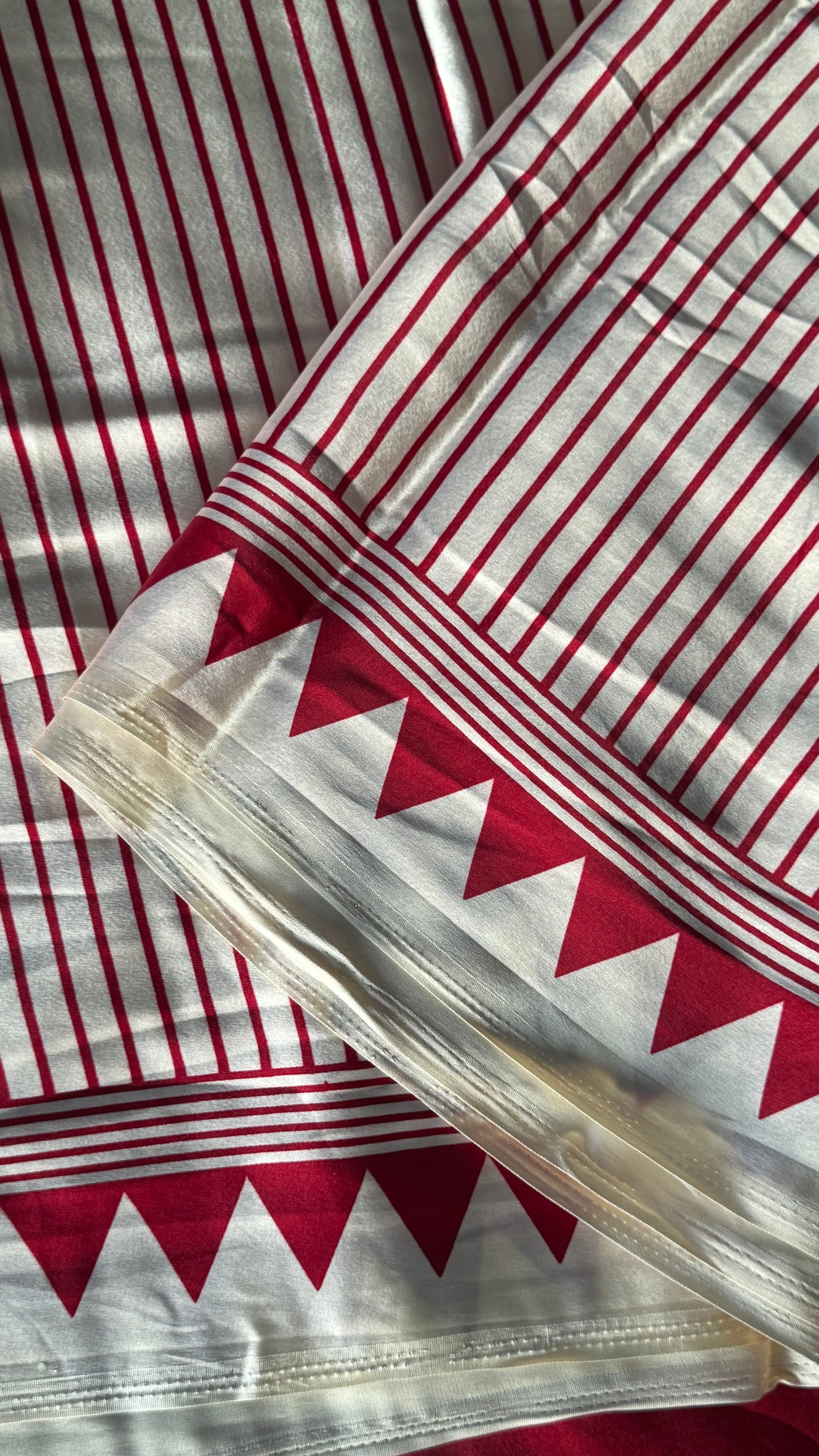 White and Red Modal Satin Saree with Temple Printed Border & Circle Design Pallu