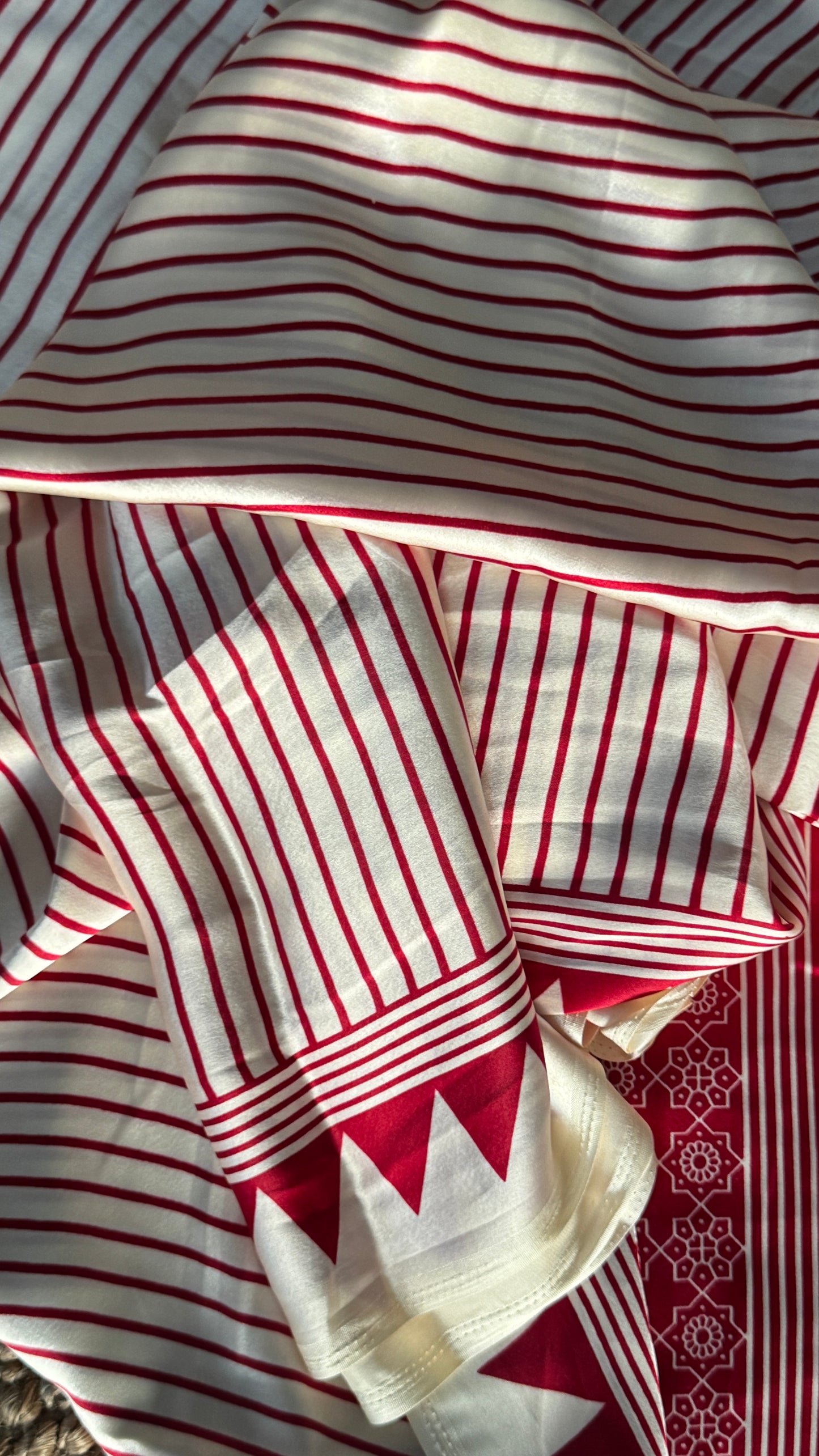 White and Red Modal Satin Saree with Temple Printed Border & Circle Design Pallu