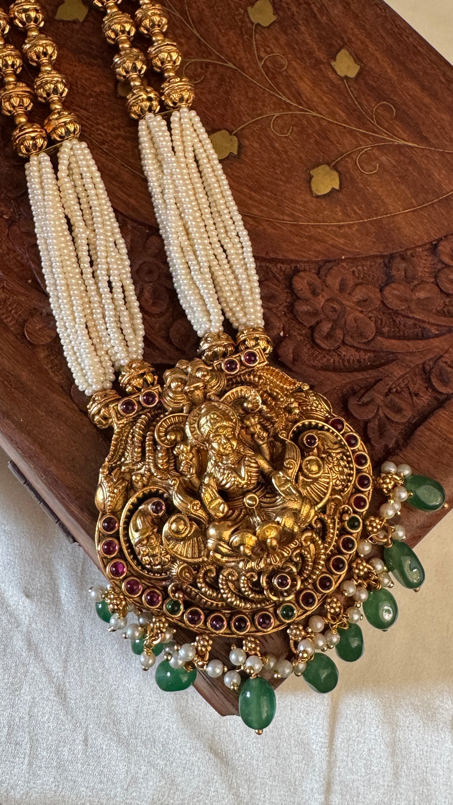 Gold Plated Long White Beaded Temple jewellery Set - Lakshmi Pendant and Jhumka