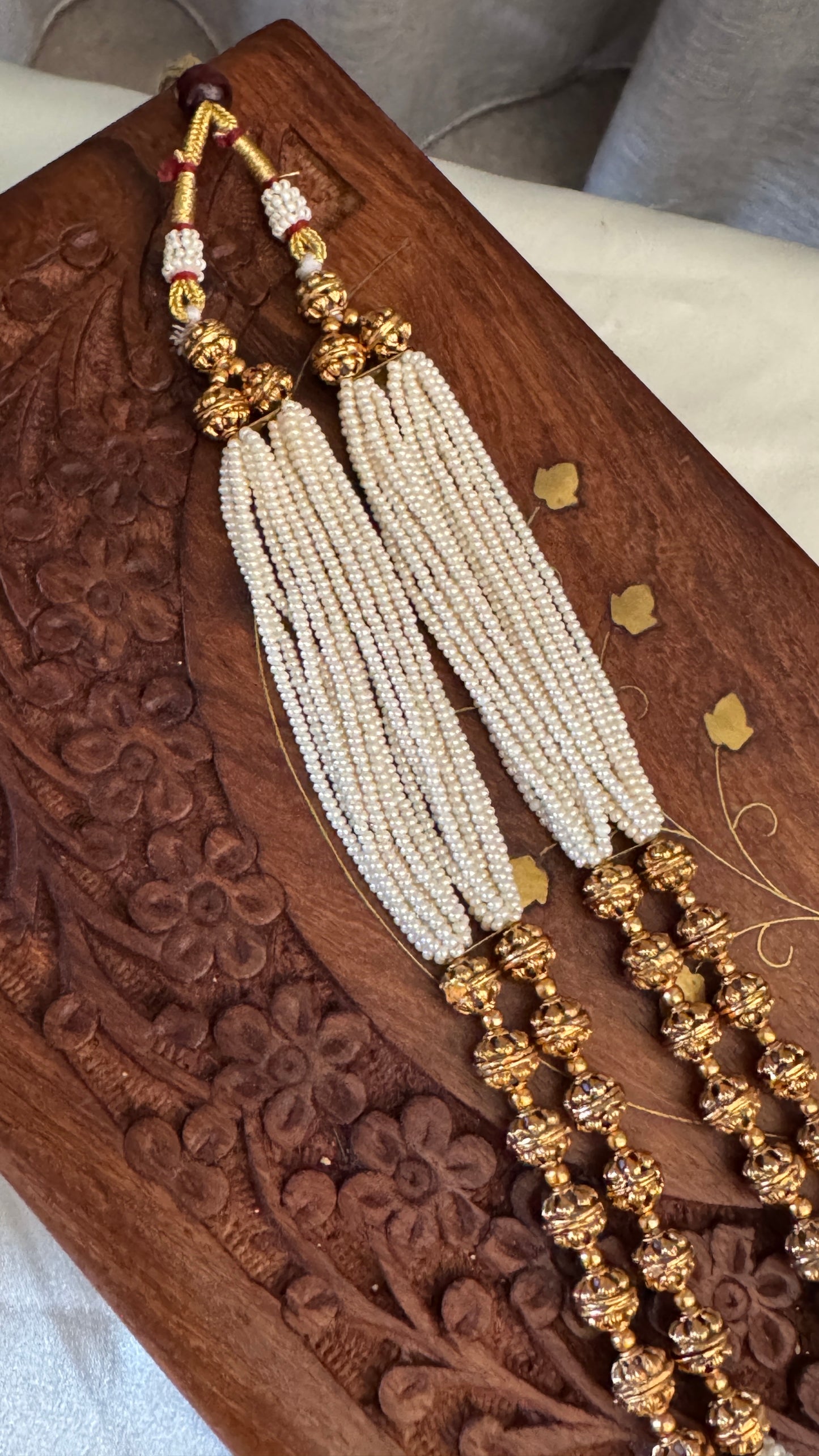 Gold Plated Long White Beaded Temple jewellery Set - Lakshmi Pendant and Jhumka