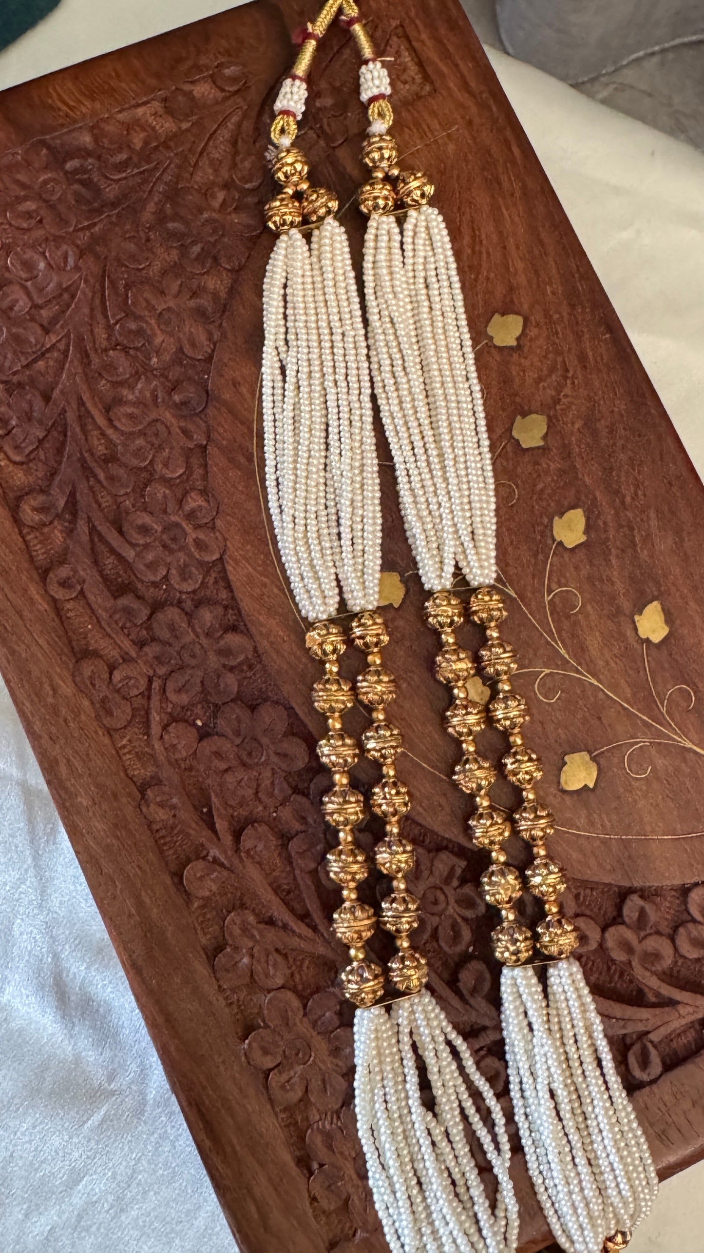 Gold Plated Long White Beaded Temple jewellery Set - Lakshmi Pendant and Jhumka