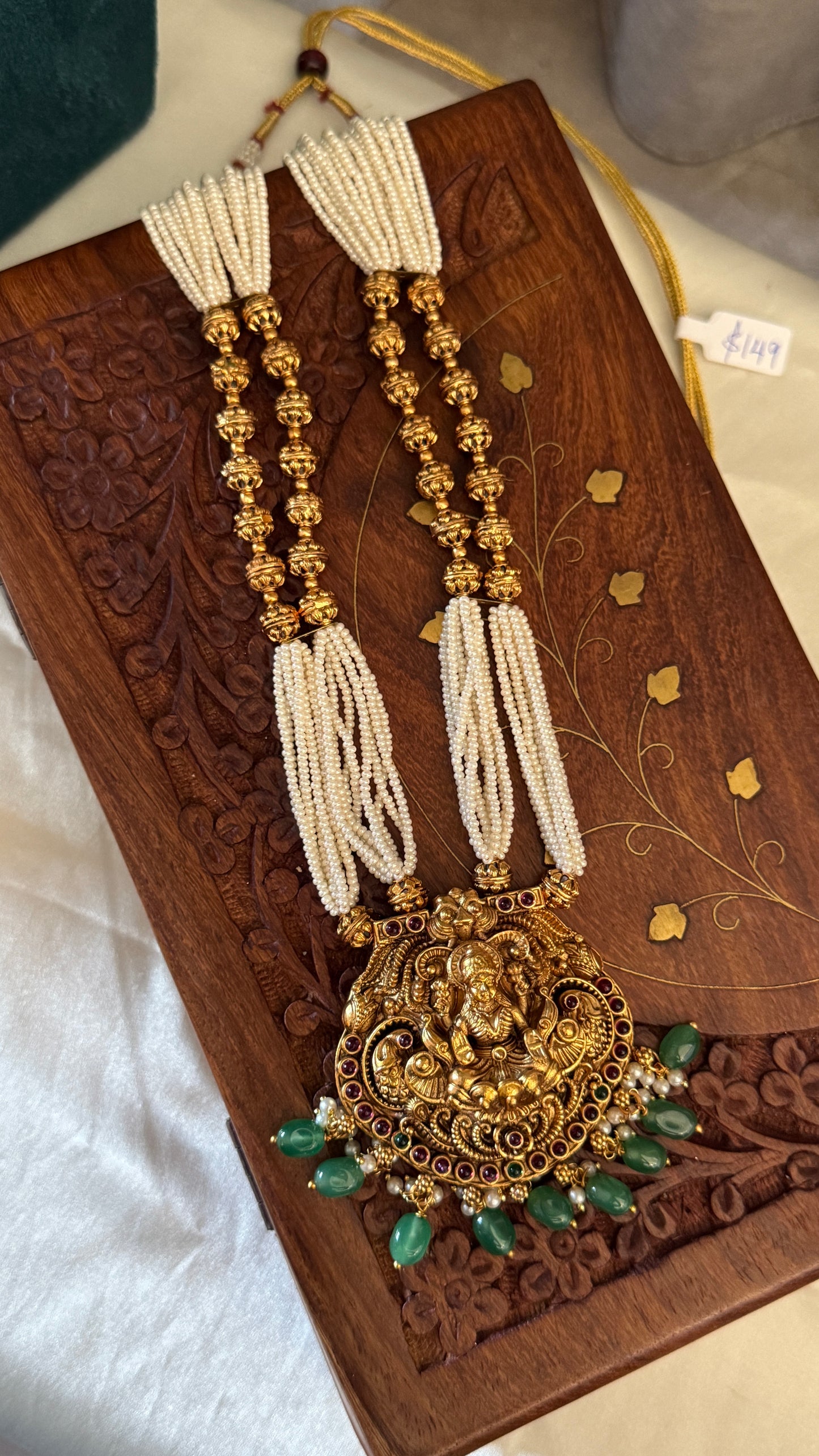 Gold Plated Long White Beaded Temple jewellery Set - Lakshmi Pendant and Jhumka