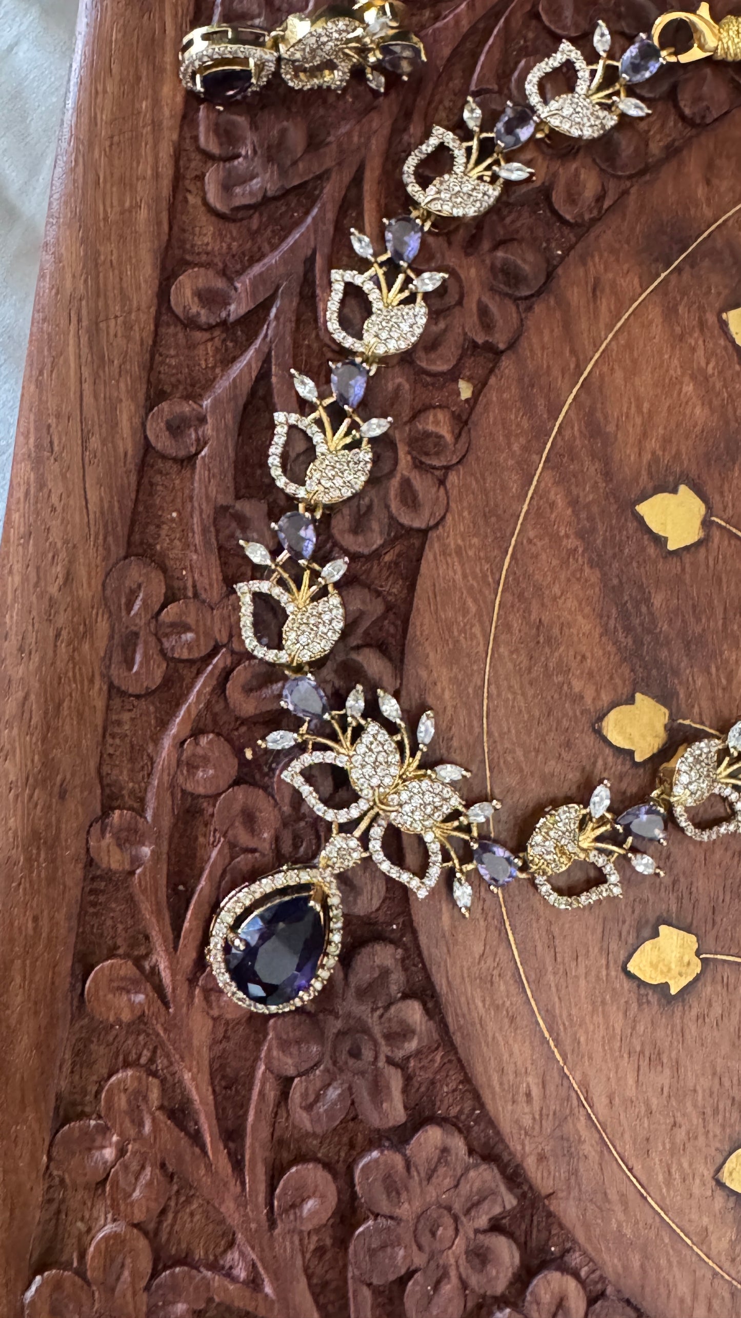 Handcrafted Necklace and Earring Set with AD Stones - White and Purple stones
