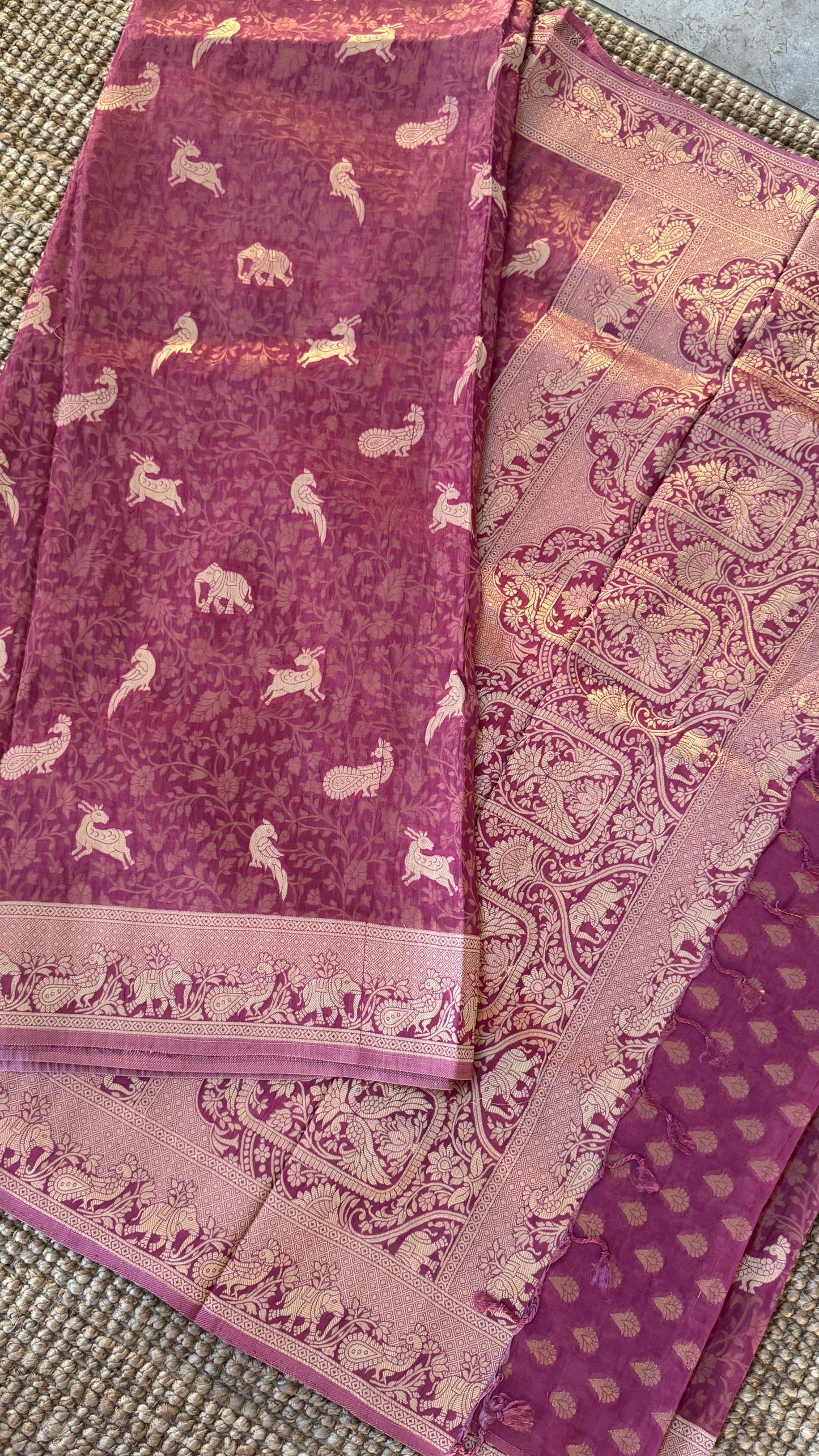Soft Tissue Silk Saree in Unique Pink Shade with Intricate Animal Motifs