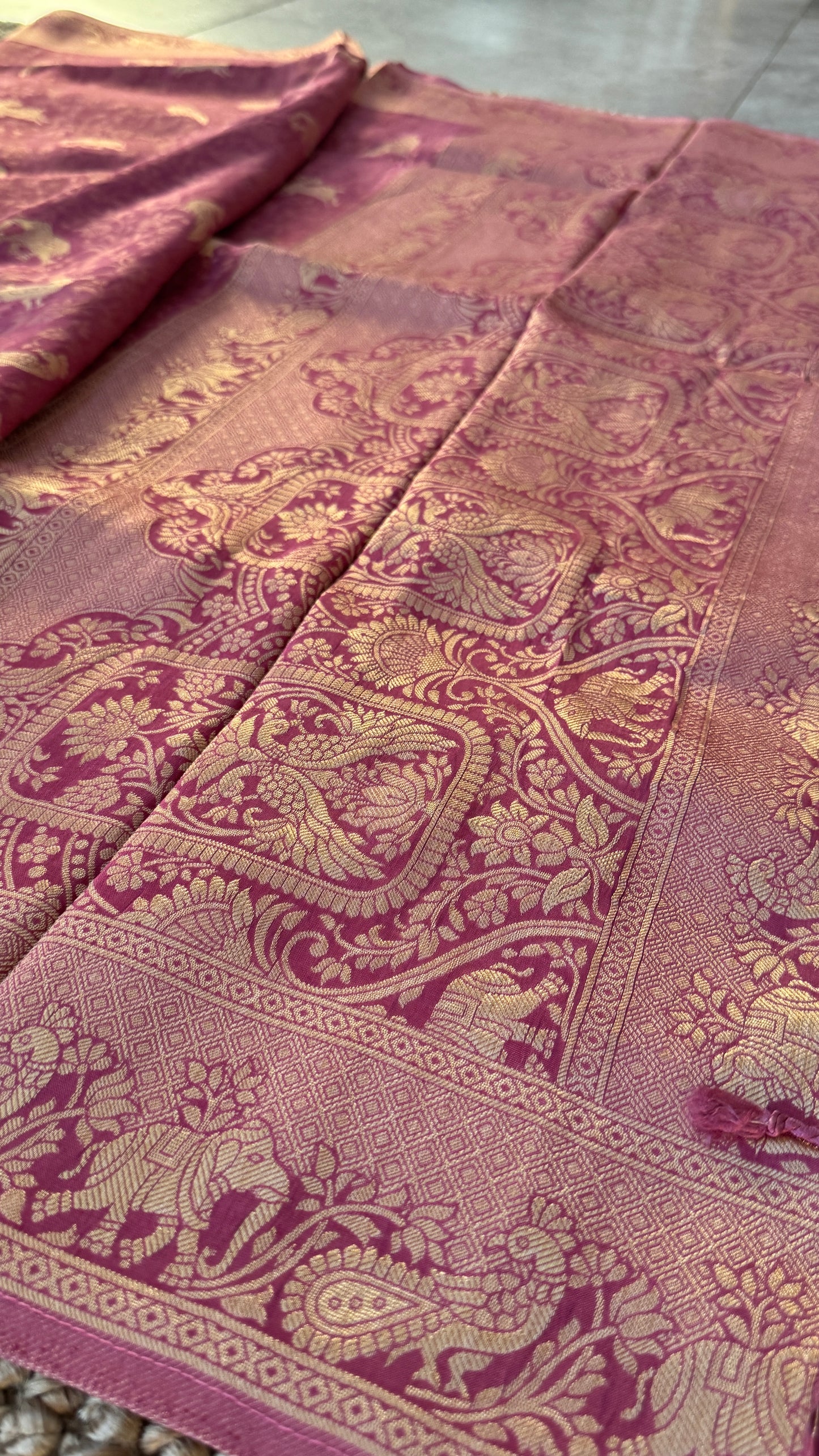 Soft Tissue Silk Saree in Unique Pink Shade with Intricate Animal Motifs