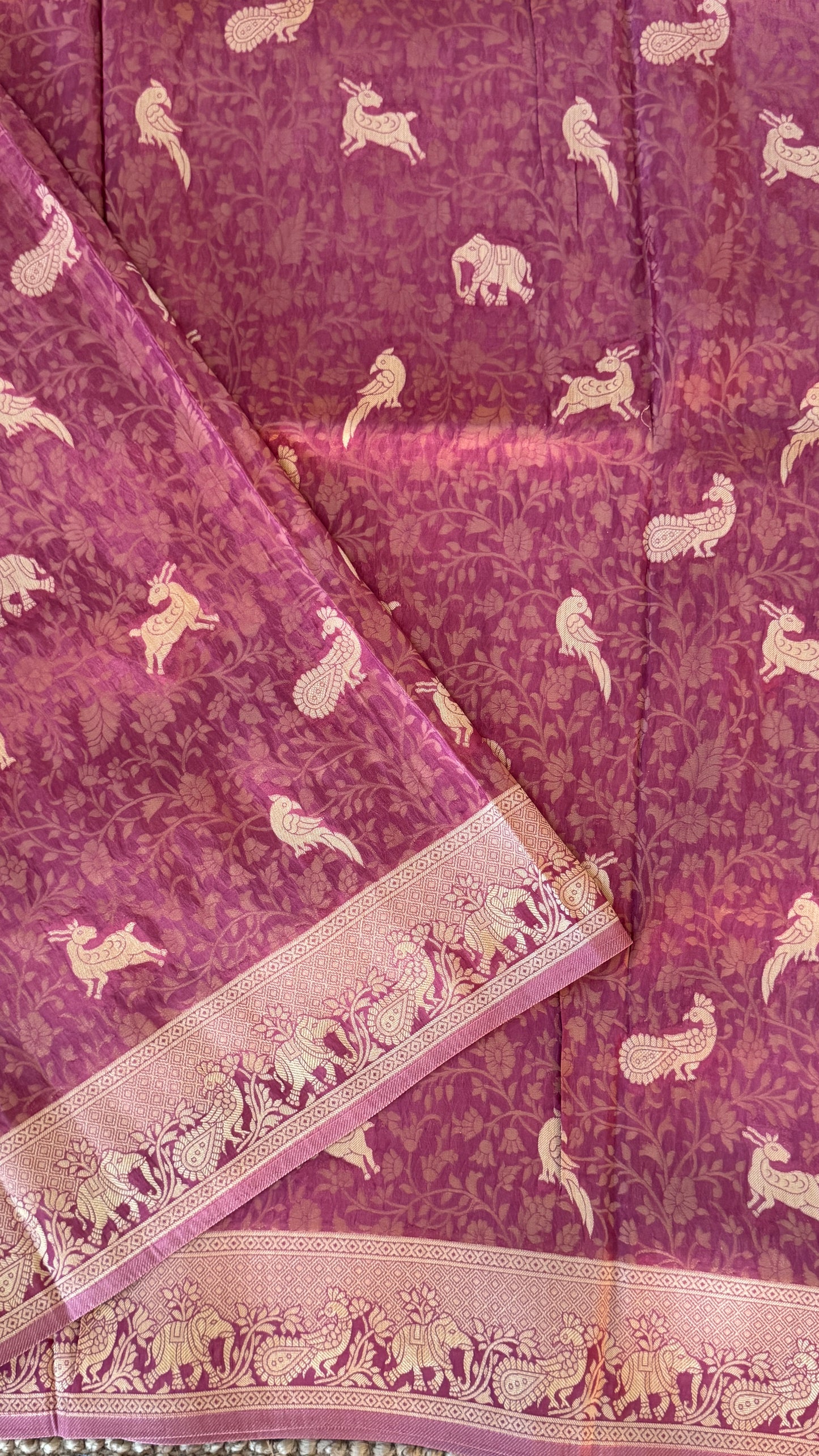 Soft Tissue Silk Saree in Unique Pink Shade with Intricate Animal Motifs