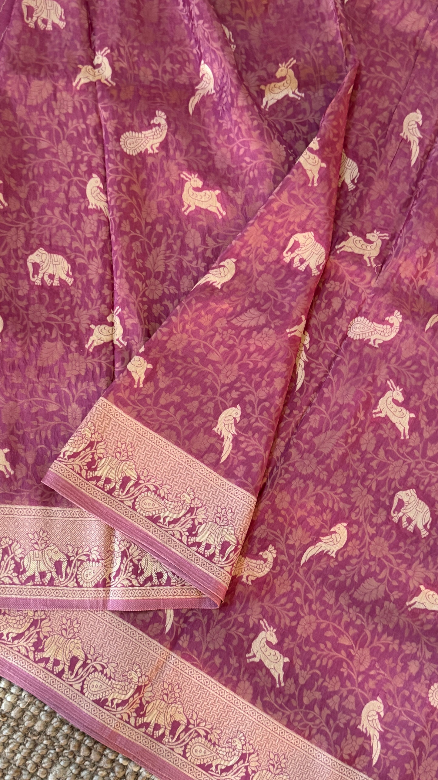 Soft Tissue Silk Saree in Unique Pink Shade with Intricate Animal Motifs