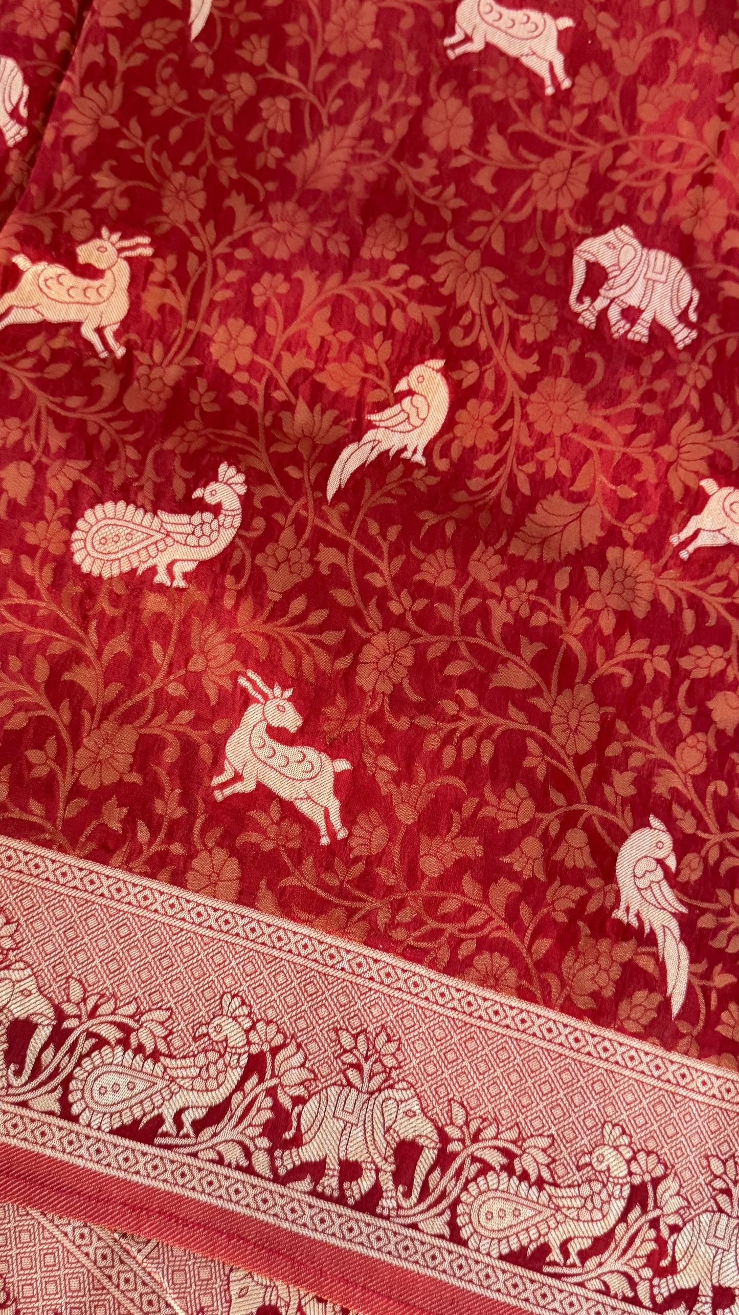 Soft Tissue Silk Saree in Unique Rust Shade with Intricate Animal Motifs