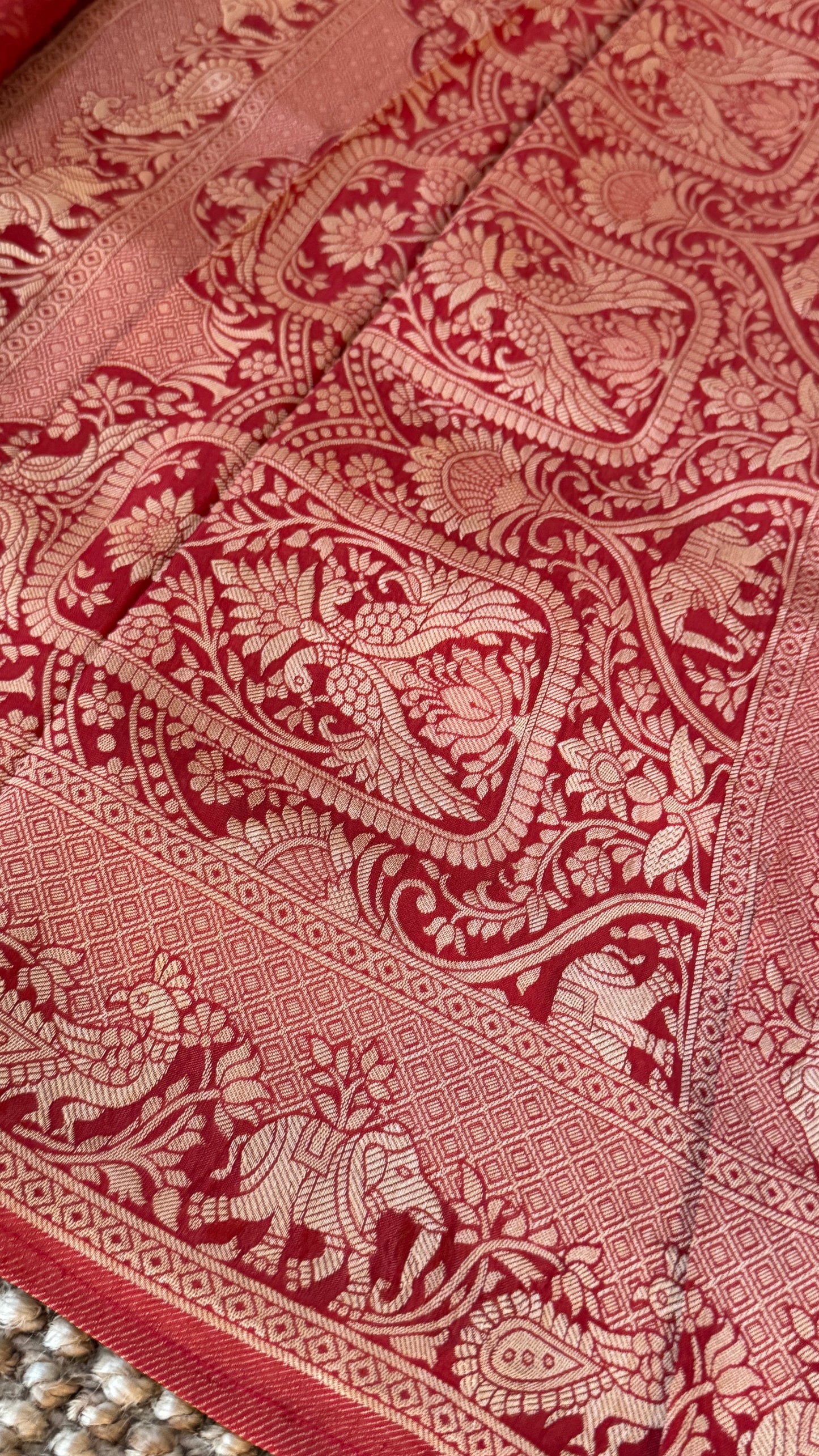 Soft Tissue Silk Saree in Unique Rust Shade with Intricate Animal Motifs