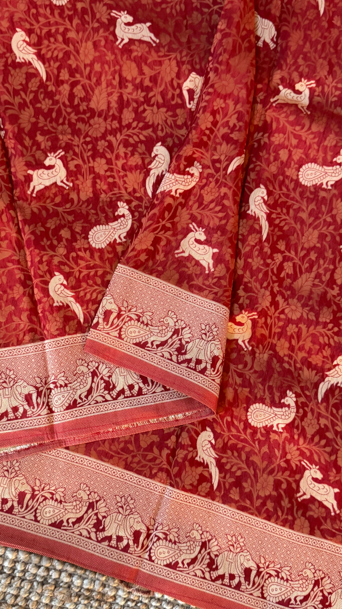 Soft Tissue Silk Saree in Unique Rust Shade with Intricate Animal Motifs