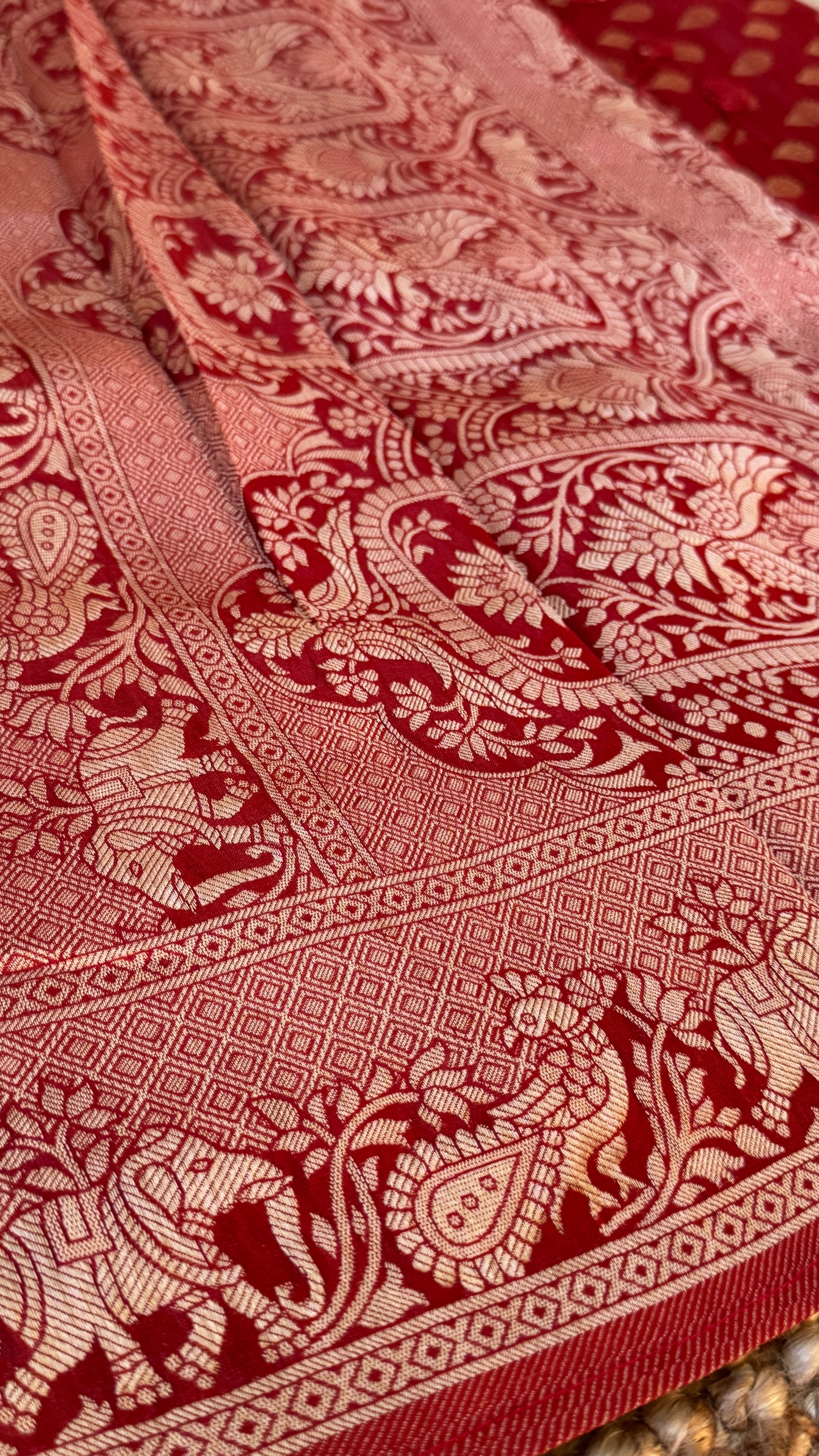 Soft Tissue Silk Saree in Unique Rust Shade with Intricate Animal Motifs