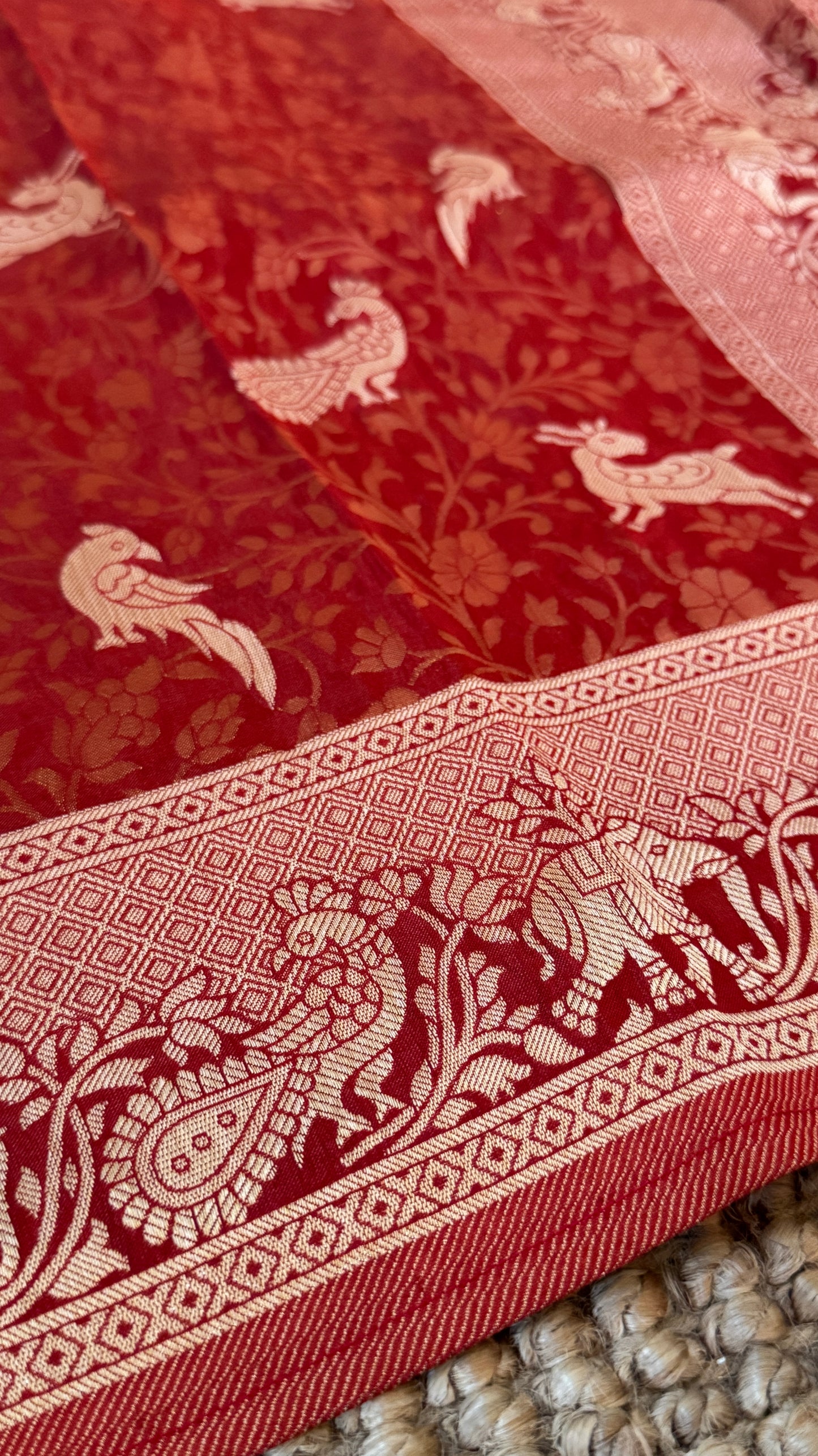 Soft Tissue Silk Saree in Unique Rust Shade with Intricate Animal Motifs