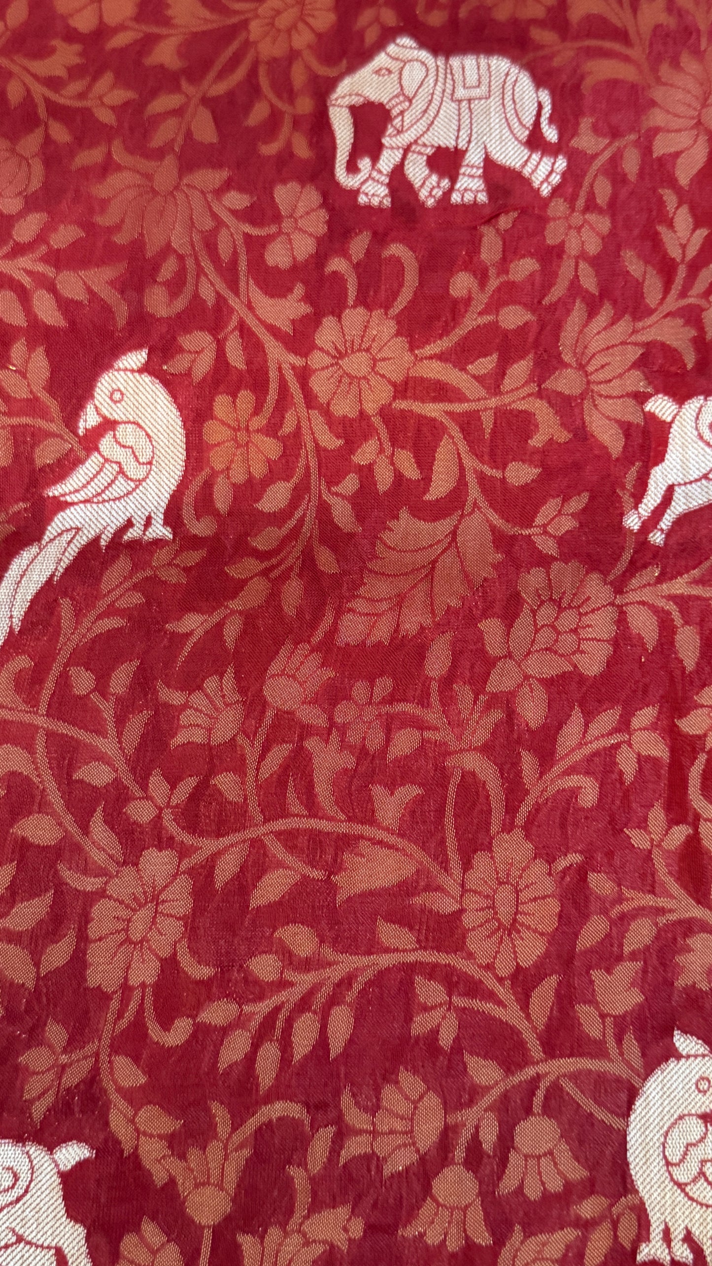 Soft Tissue Silk Saree in Unique Rust Shade with Intricate Animal Motifs