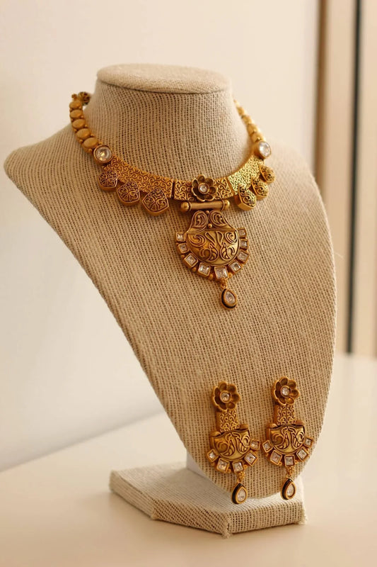 Gorgeous Matt gold necklace set with white stone details