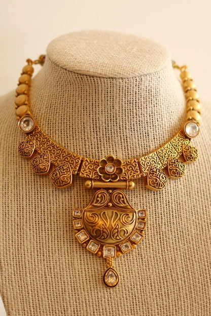 Gorgeous Matt gold necklace set with white stone details