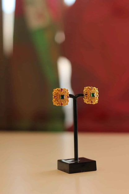 Gold square shaped stud earrings