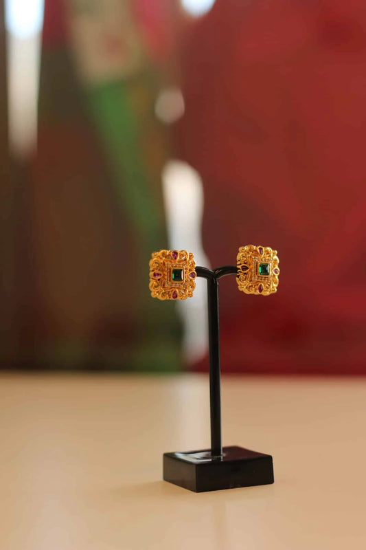 Gold square shaped stud earrings