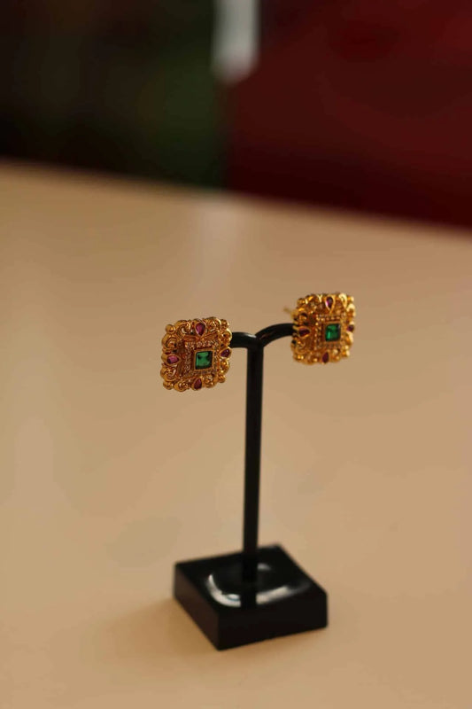 Gold square shaped stud earrings