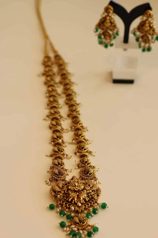 Long Bridal Temple Jewellery with pearl emerald,and ruby color stone details.