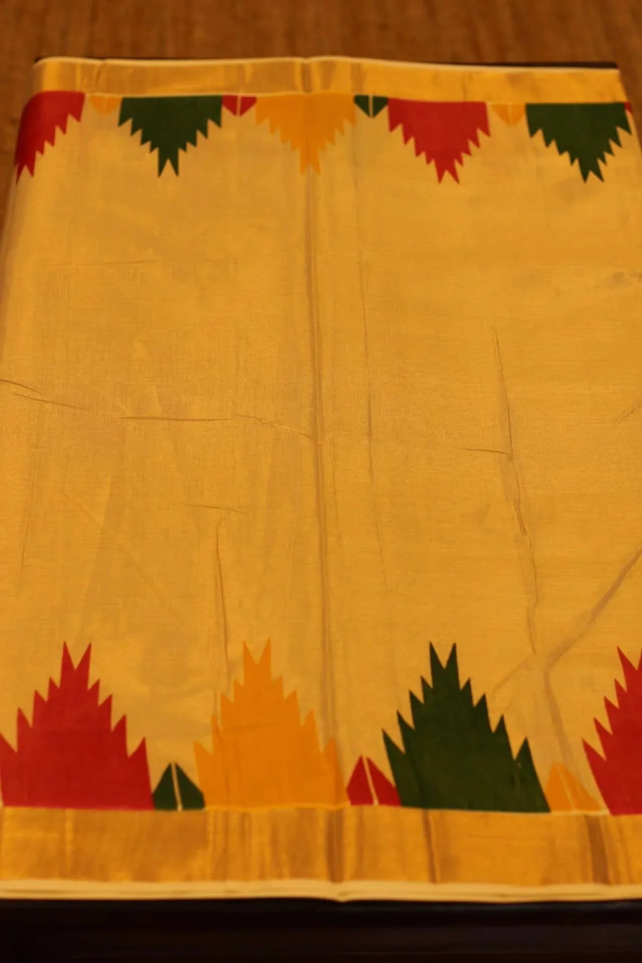 Onam saree with gold and temple border prints