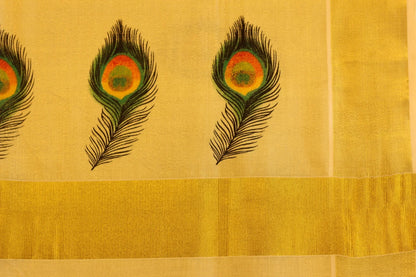 Onam saree with gold border and peacock feather design