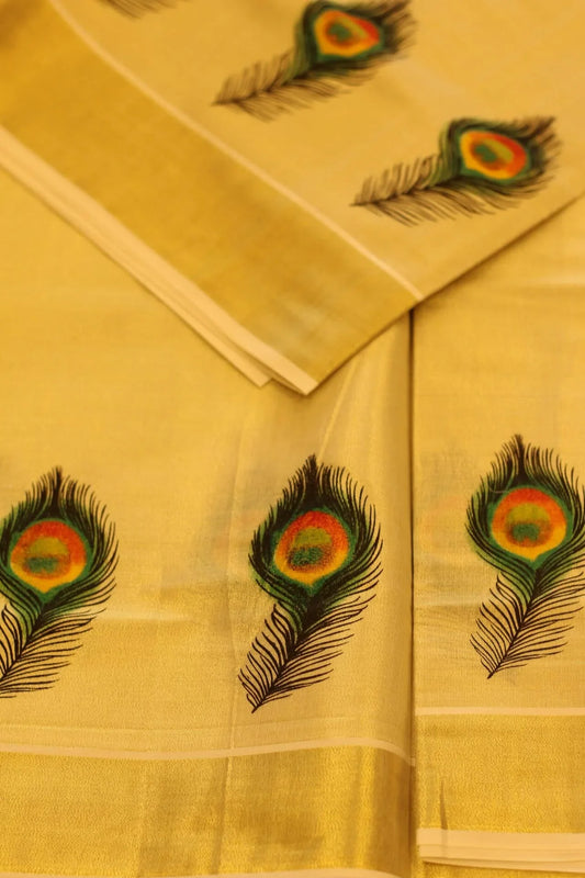 Onam saree with gold border and peacock feather design