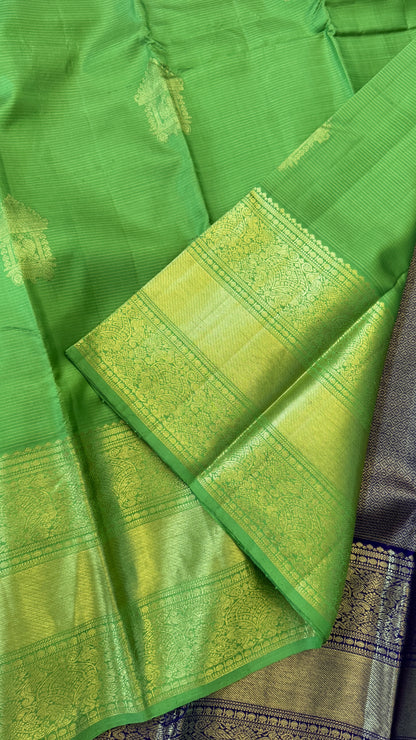 KANJIVARAM PURE SILK HANDLOOM SAREE – PARROT GREEN & PURPLE BORDER