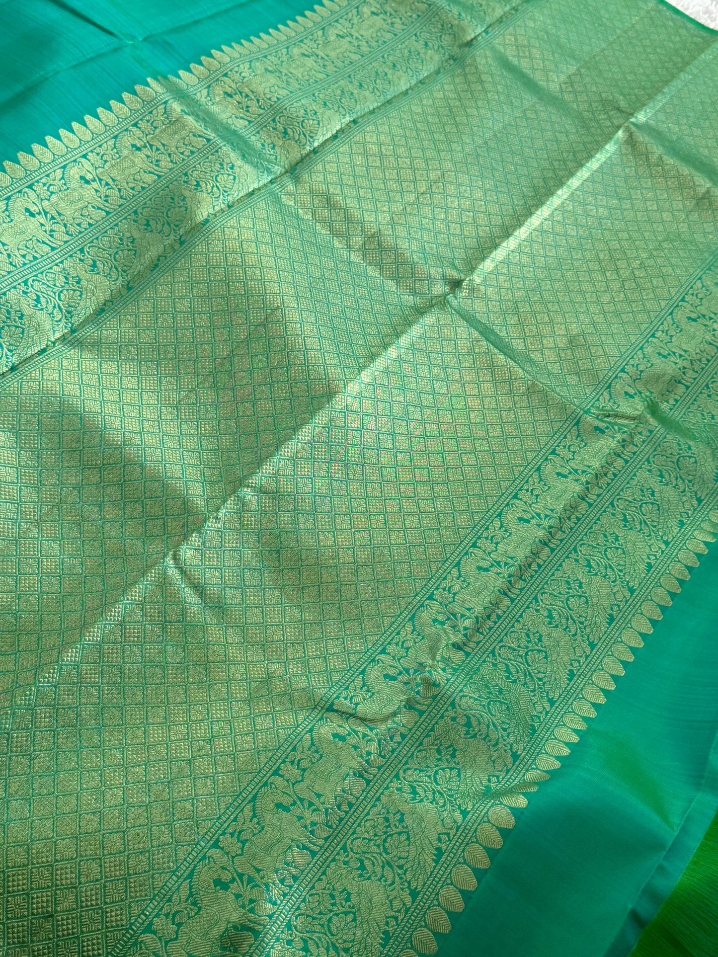 KANJIVARAM PURE SILK SAREE – Rama Green with Turning Border