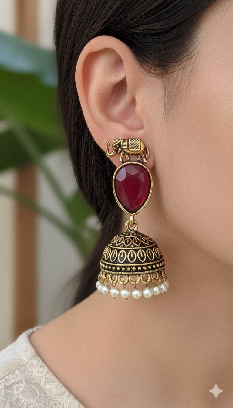 Antique Black Gold Finish Jhumka with Maroon Stone and Elephant motif