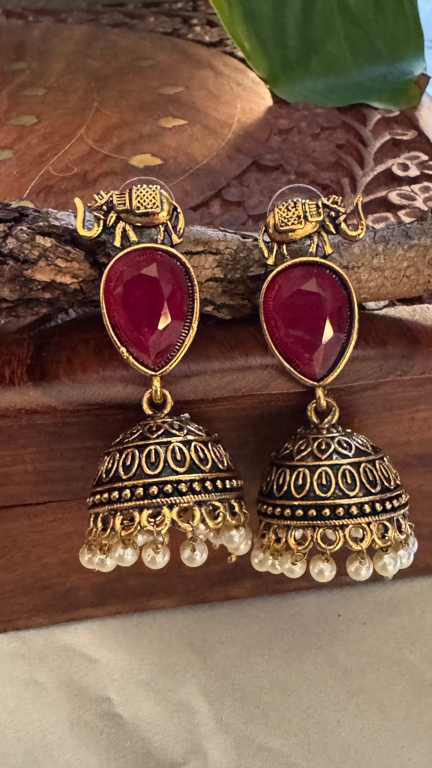 Antique Black Gold Finish Jhumka with Maroon Stone and Elephant motif