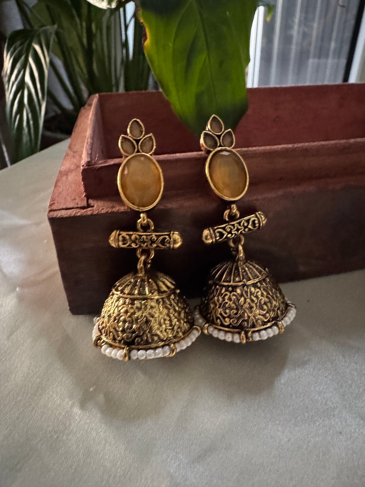 Antique Black Gold Finish Jhumka with Yellow Pearl detailing
