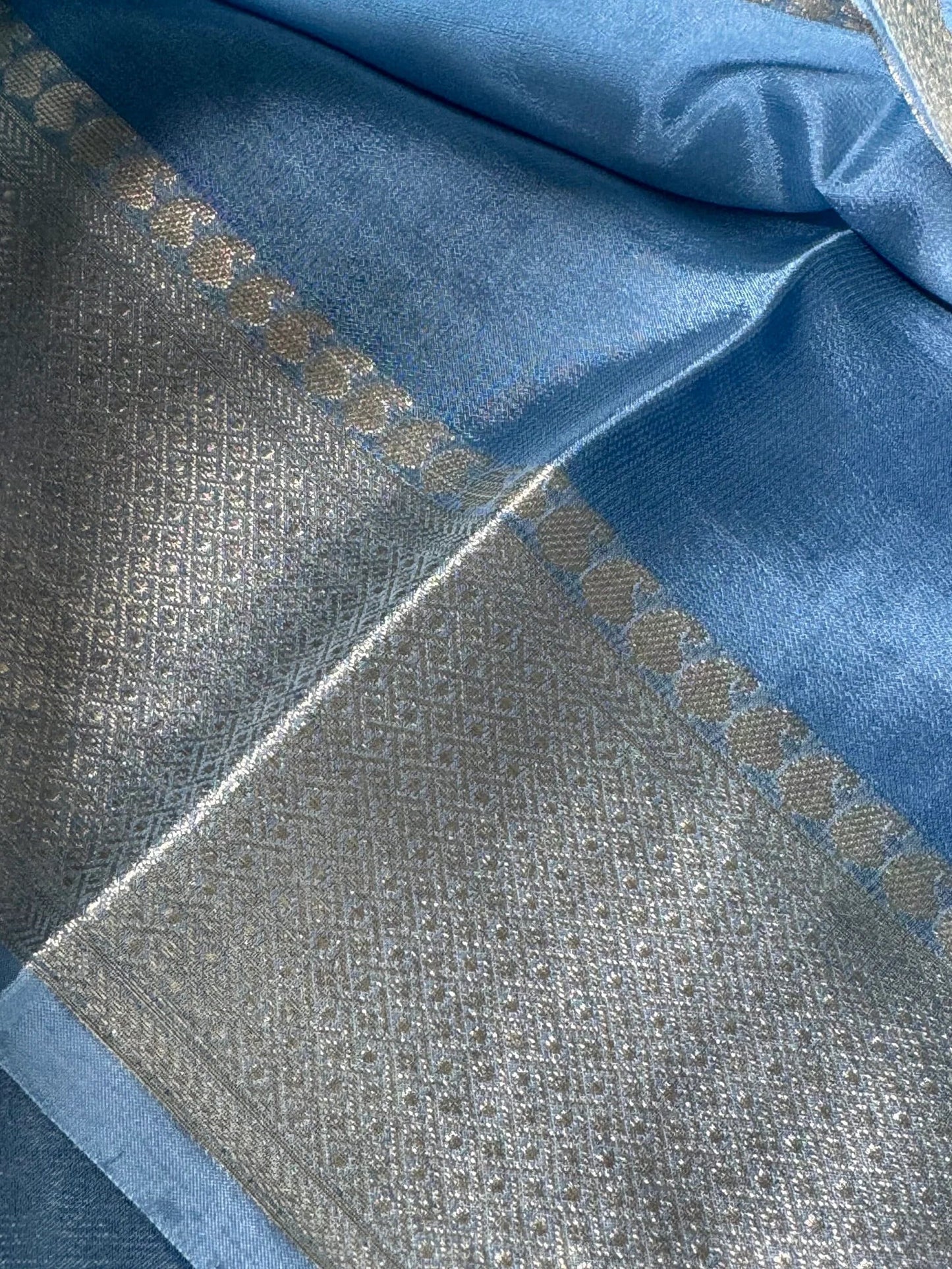 Shimmery Georgette Saree in Bluish grey with Silver Zari Border