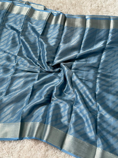 Shimmery Georgette Saree in Bluish grey with Silver Zari Border