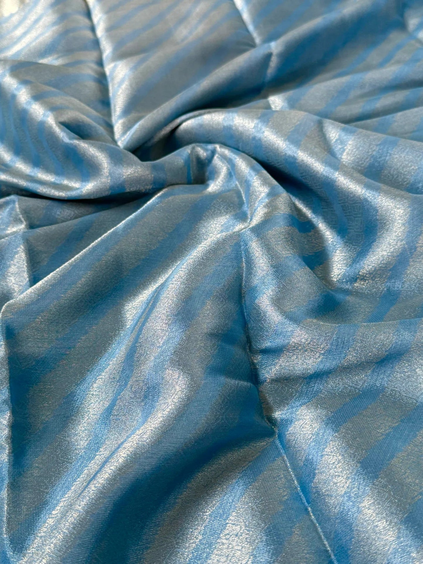Shimmery Georgette Saree in Bluish grey with Silver Zari Border