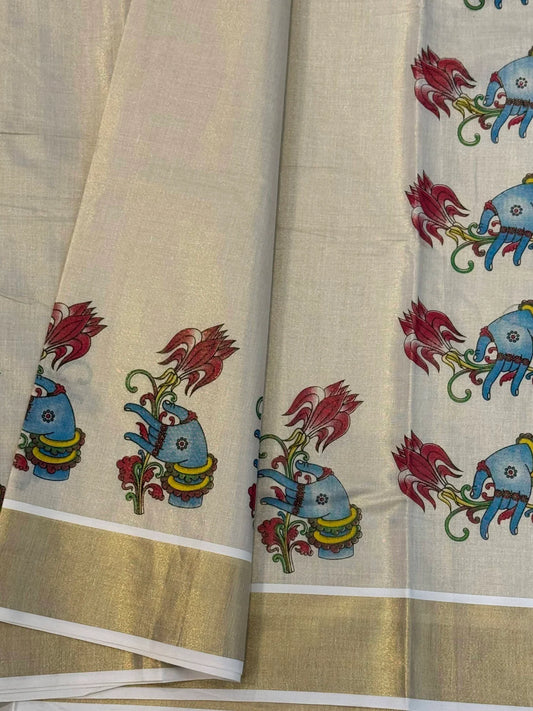 Onam tissue silk saree with gold zari border