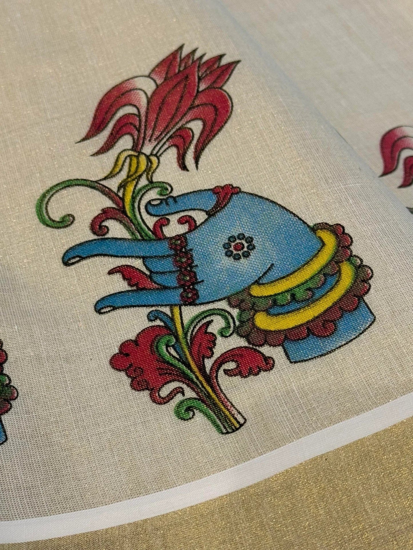Onam tissue silk saree with gold zari border