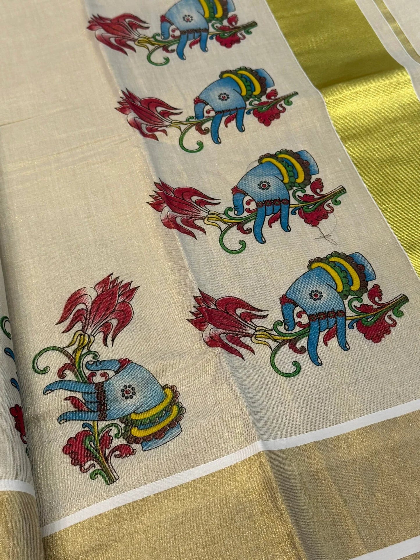 Onam tissue silk saree with gold zari border