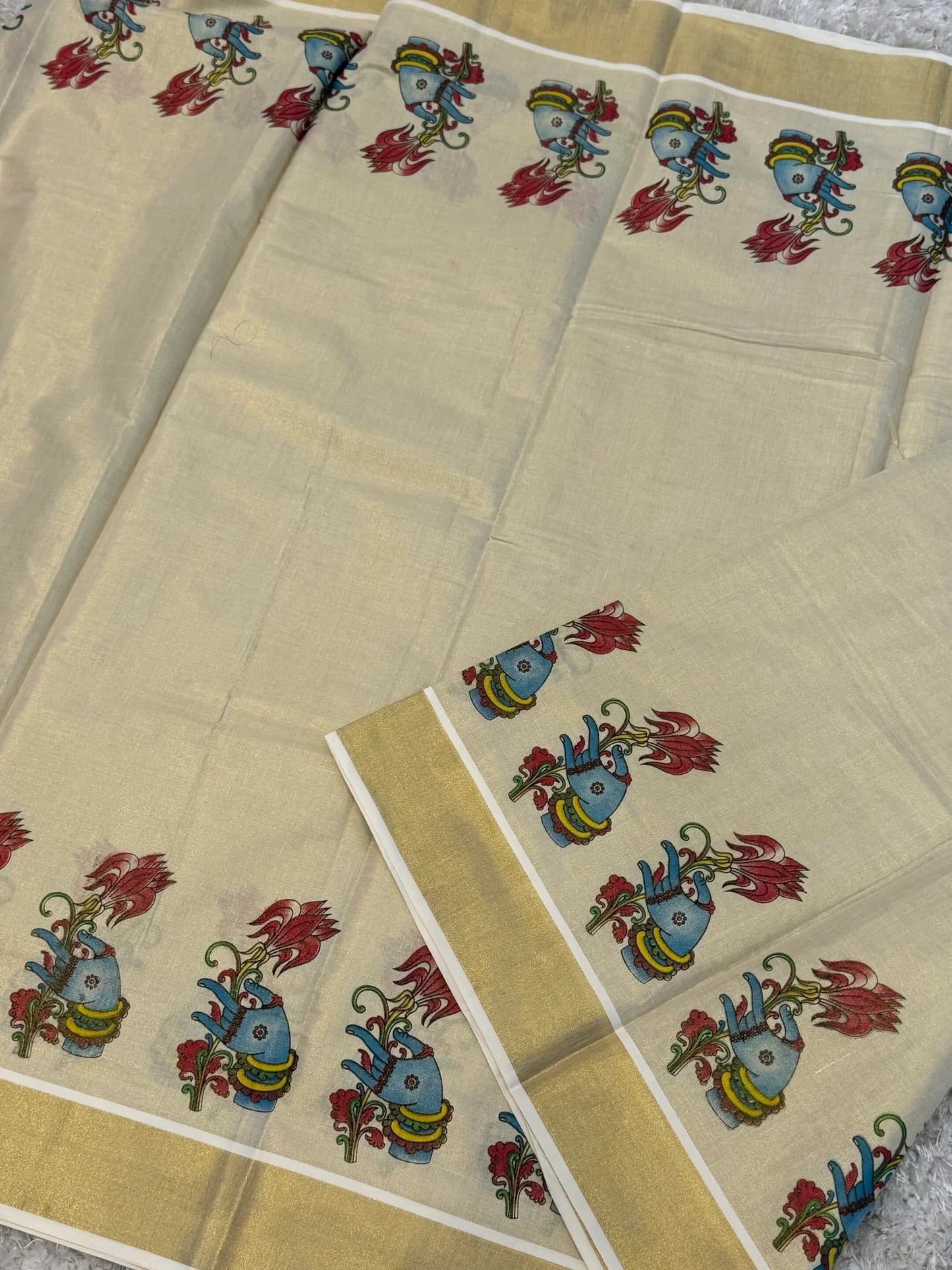 Onam tissue silk saree with gold zari border