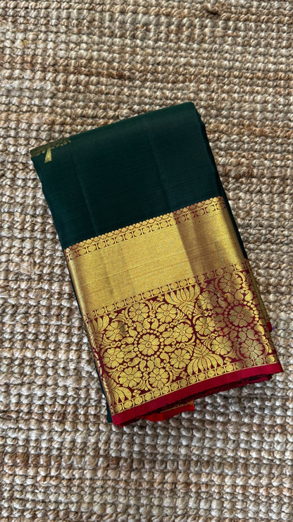 KANJIVARAM PURE SILK HANDLOOM SAREE in Bottle Green and contrast Red Pallu and Border