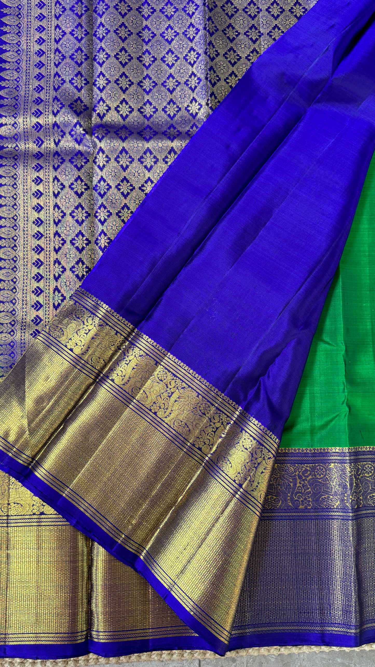 KANJIVARAM PURE SILK HANDLOOM SAREE in Green with Yali motif in Royal Blue
