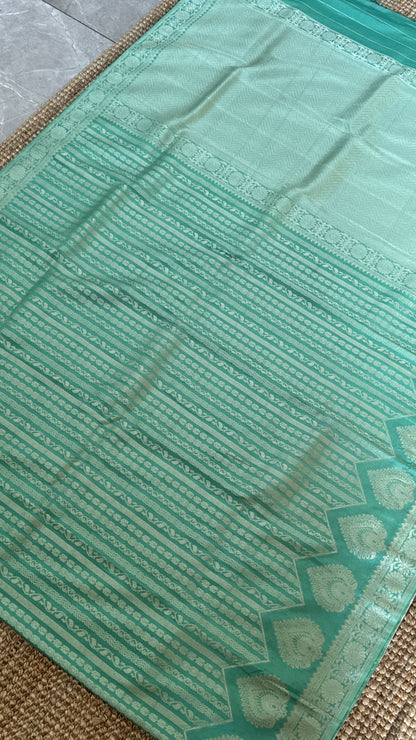 Elegant Georgette Crepe Silk Saree with Silver Banarasi Borders - Aqua/ Sea green